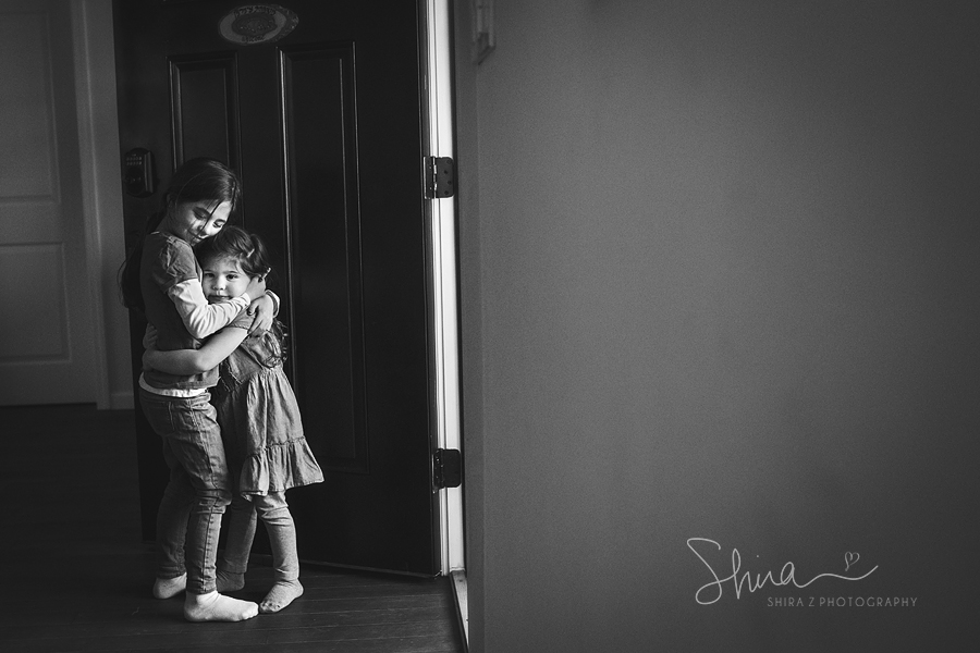 two sisters hugging photo by long island family photographer